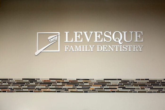 Levesque Dentistry sign
